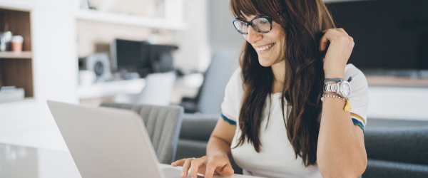 Board member searching for HOA Management company on a laptop